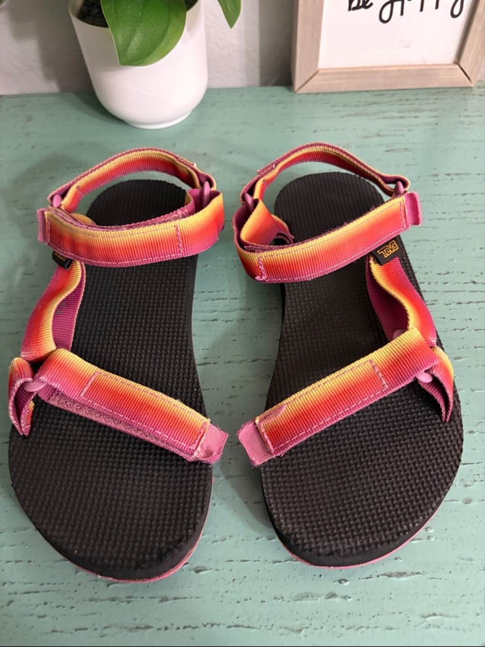 Teva Black Sandals with Pink-Orange-Yellow Gradient Straps